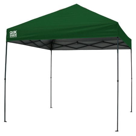 The photo showcases the Quik Shade Weekender 10' x 10' Straight Leg Instant Canopy in a vibrant green top. The canopy is set up in an outdoor area and is being held in place by four sturdy legs. 