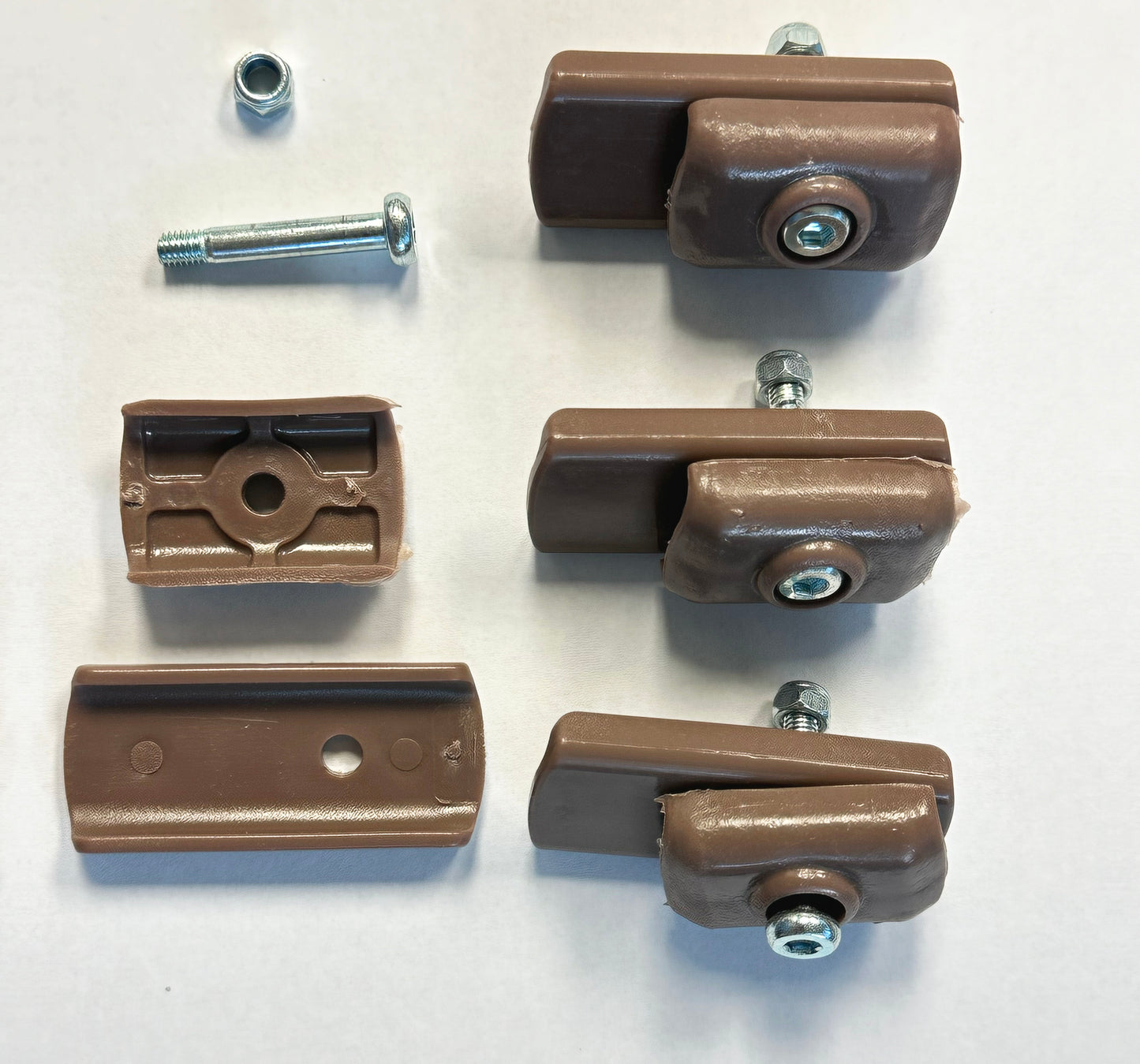 This photo showcases a set of four brown Truss Ends & Cross Connectors for Chapter 13 x 13 Pagoda Gazebo Canopy Parts. These connectors are essential components for assembling and securing the frame of your gazebo canopy, ensuring a stable and functional shelter for a variety of outdoor activities. Their brown color not only blends seamlessly with the gazebo's aesthetics but also provides the necessary structural support.