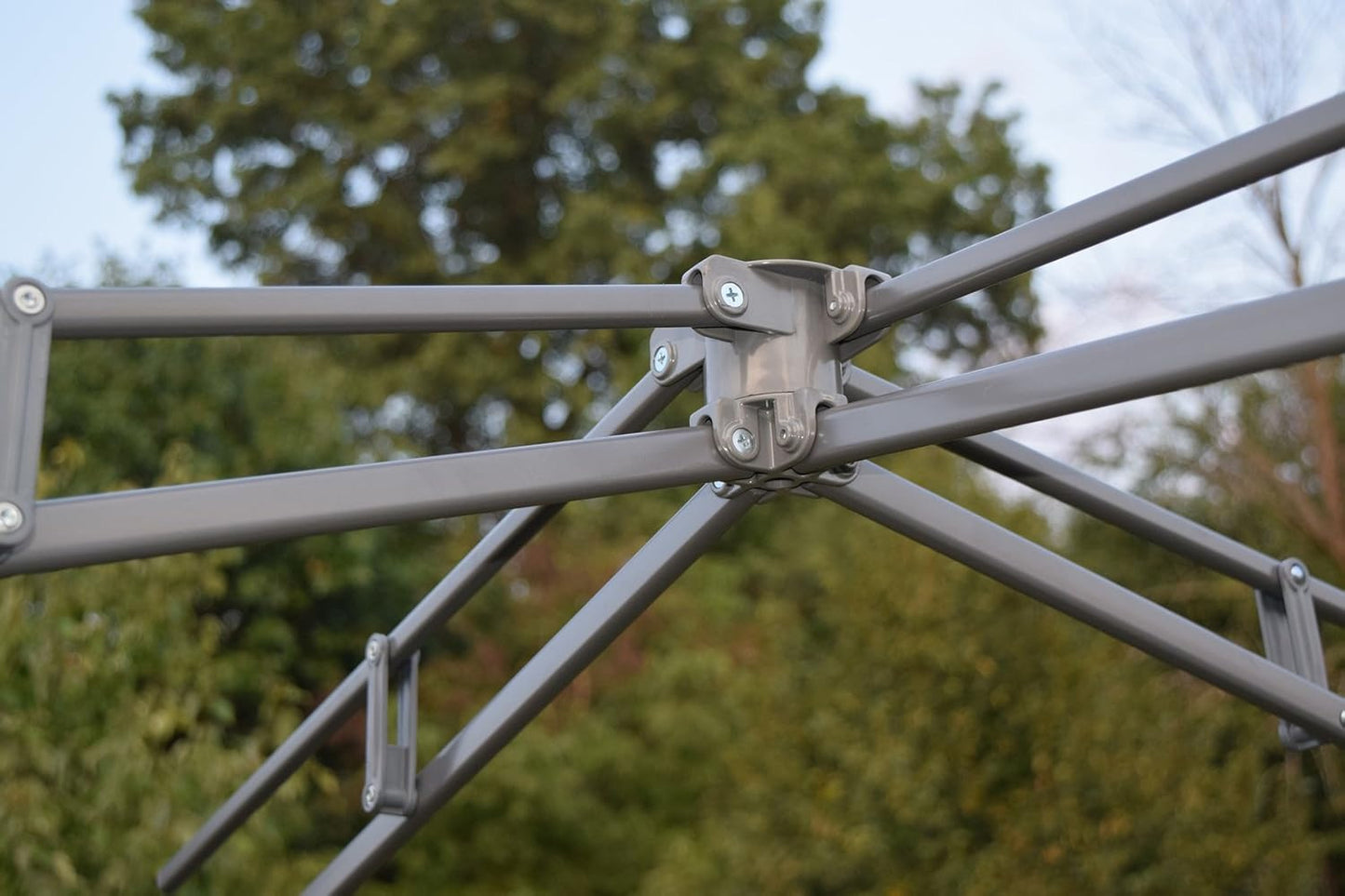 Replacement center hub connected to canopy frame on Coleman 13 x 13 shelter