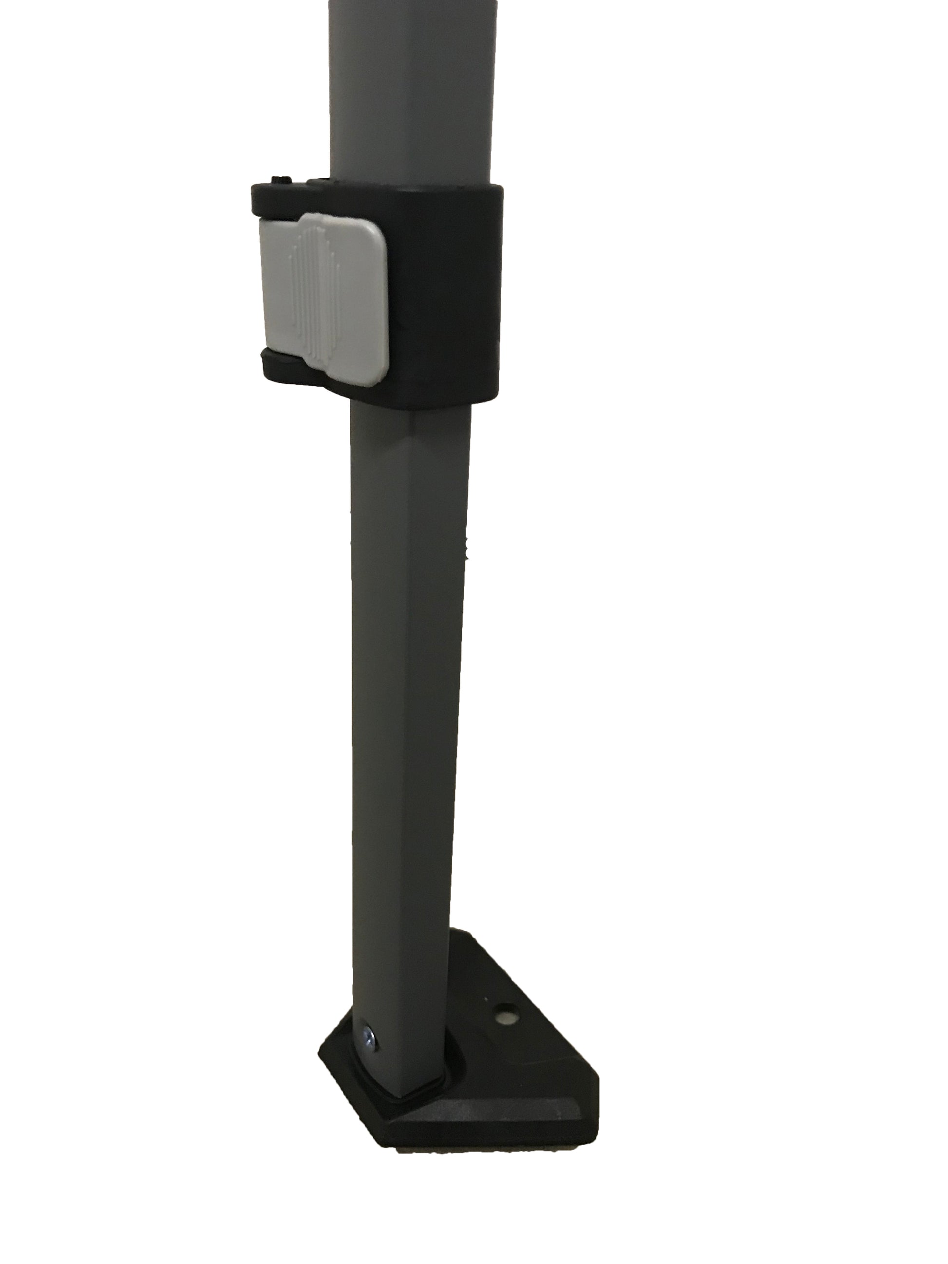 The image features a close-up of a black tent leg with a square-shaped foot for stability. Attached to the leg is a white push-button mechanism, typically used for adjusting the height or securing the leg in place. The leg is constructed of a material that appears to be metal, and the foot is secured with visible screws, suggesting the structure is designed for durability and outdoor use.