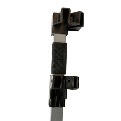 Dark gray canopy leg section with plastic cap and slider, shown with securing strap on white background